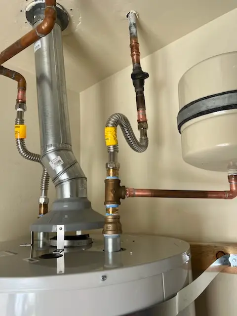 Water heater installation and plumbing repair in Delong